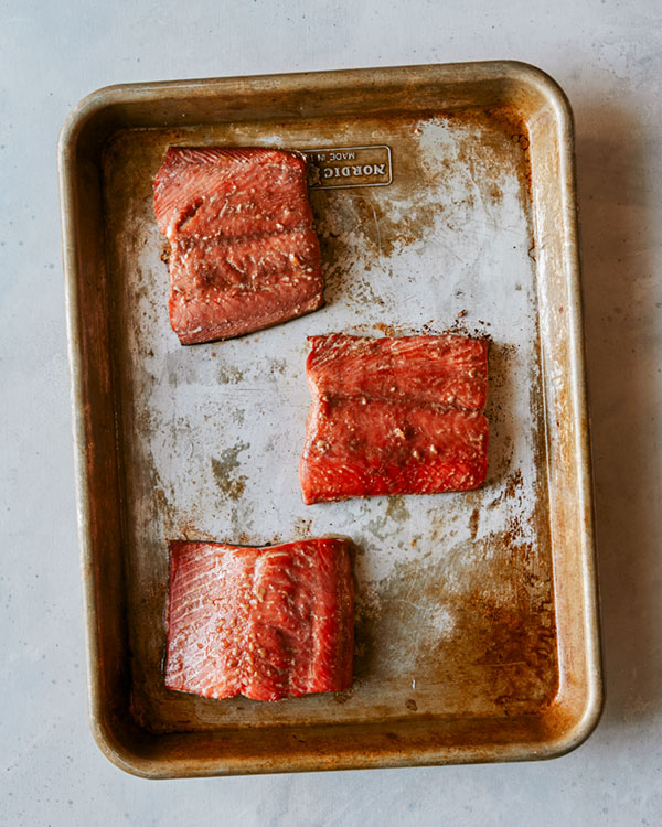 Teriyaki salmon on a baking sheet. 