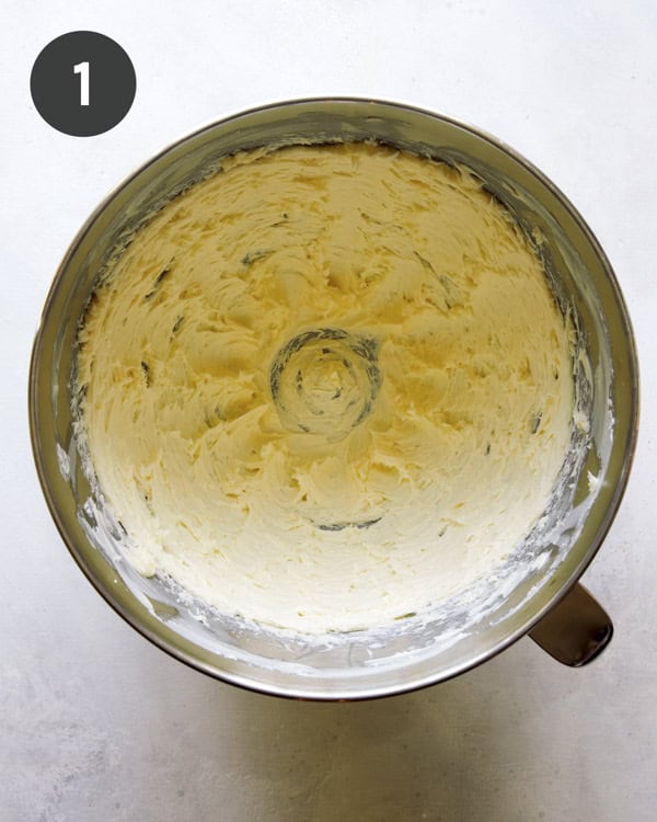 Butter being creamed in a stand mixer to make valentines day cookies.