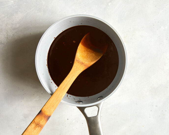 Teriyaki sauce simmered in a sauce pan.