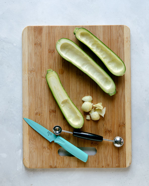 Zucchini hollowed out to make zucchini boats.