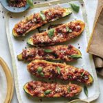 Zucchini boats on a platter.