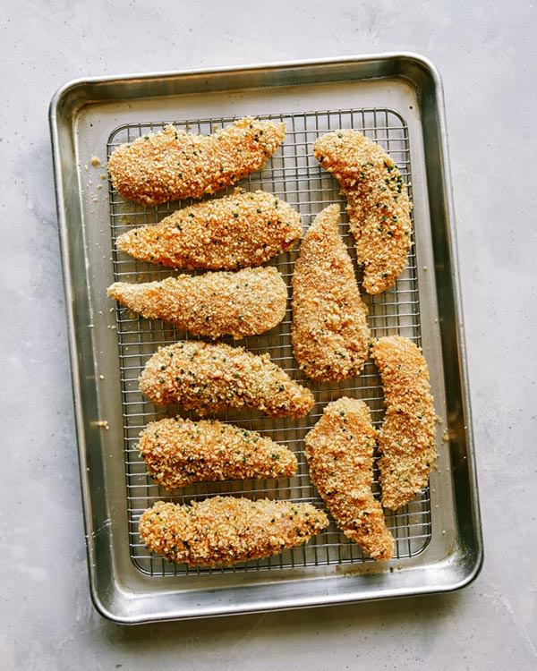 Chicken tenders ready to be air fried. 