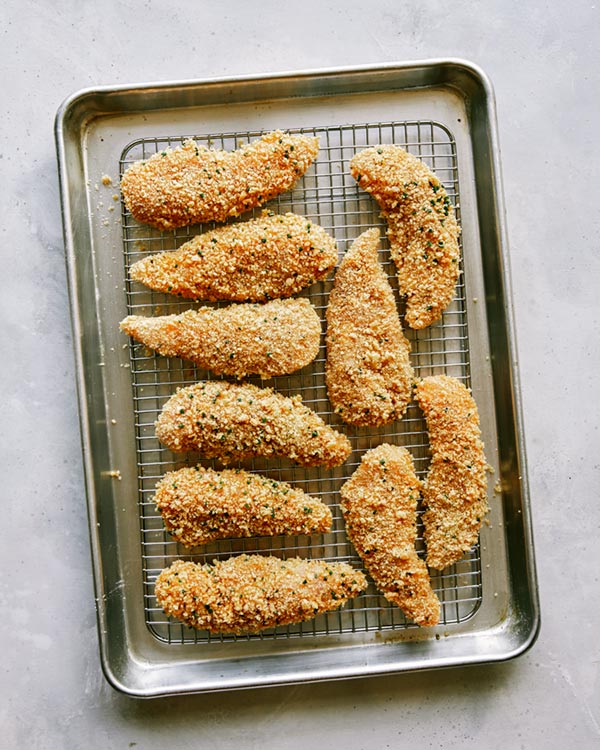 Chicken tenders ready to be air fried.