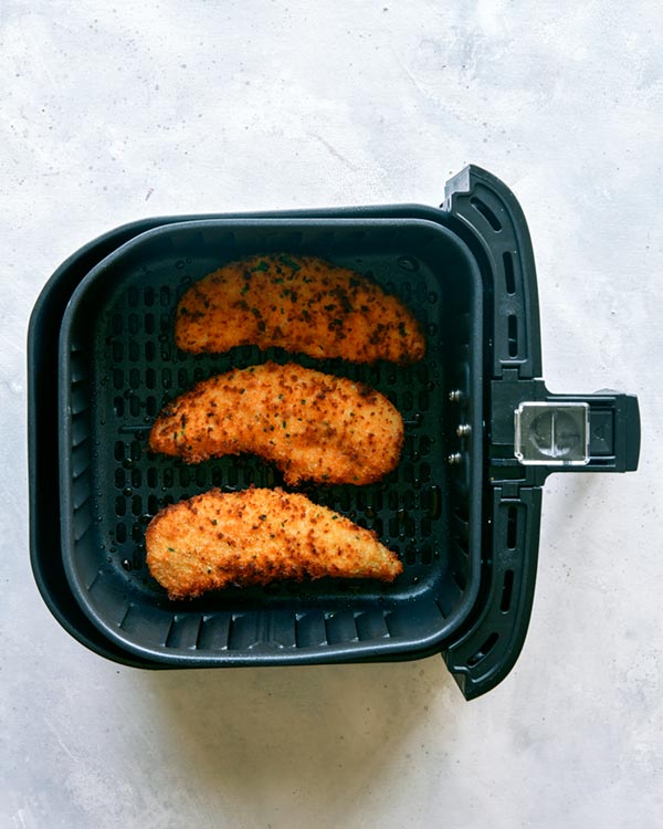 Air fryer chicken tenders cooked.