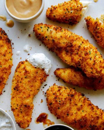 Air fryer chicken tenders with a variety of sauces.