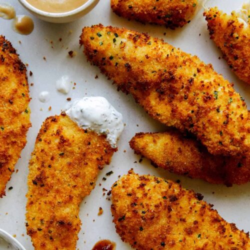 Air fryer chicken tenders with a variety of sauces.