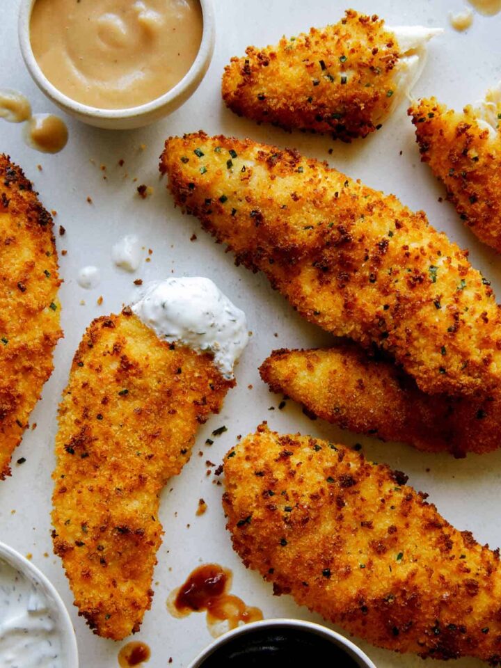 Air fryer chicken tenders with a variety of sauces.