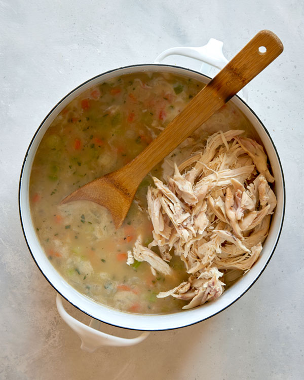 Chicken and gnocchi soup in a pot.