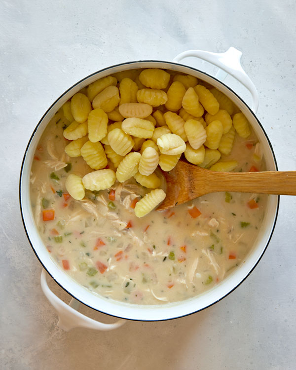 Chicken and gnocchi soup recipe in a pot.