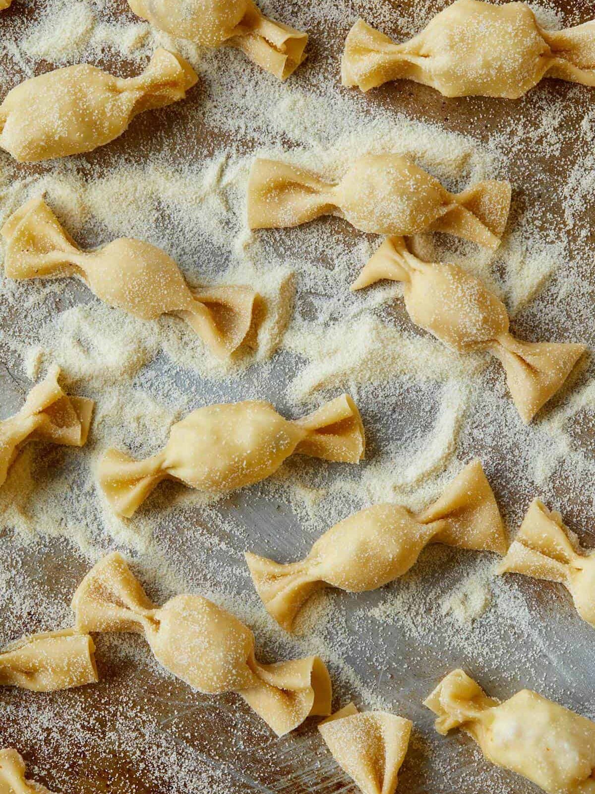 Raw lobster, corn, and tarragon caramelle in semolina flour.