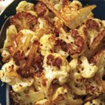 Roasted cauliflower recipe in a bowl.