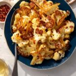 Roasted cauliflower recipe in a bowl.