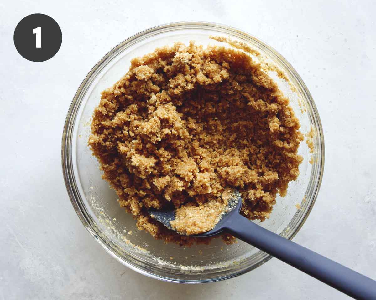 Pie crust being mixed in a bowl. 