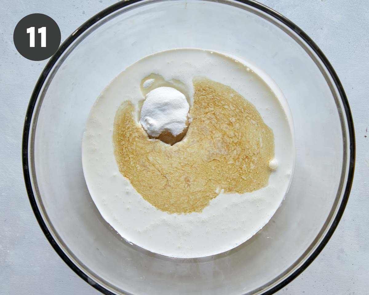 Cream, sugar, and vanilla in a bowl to make whipped cream.