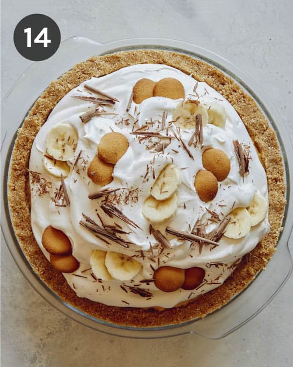 Banana cream pie finished on a kitchen counter.