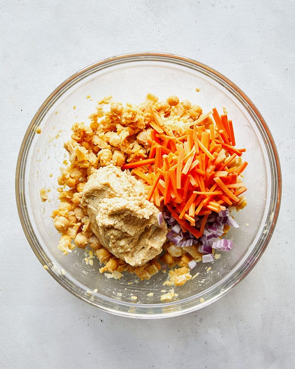 Chickpea salad in a bowl mixed together.