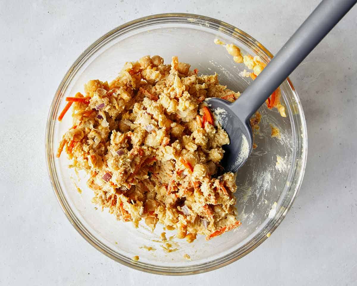 Chickpea salad sandwich mixed together in a bowl. 