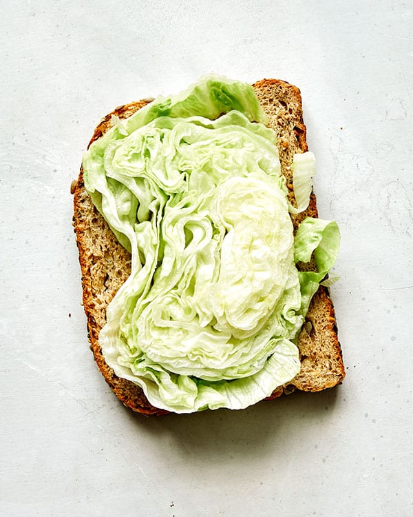 Chickpea salad sandwich with lettuce. 