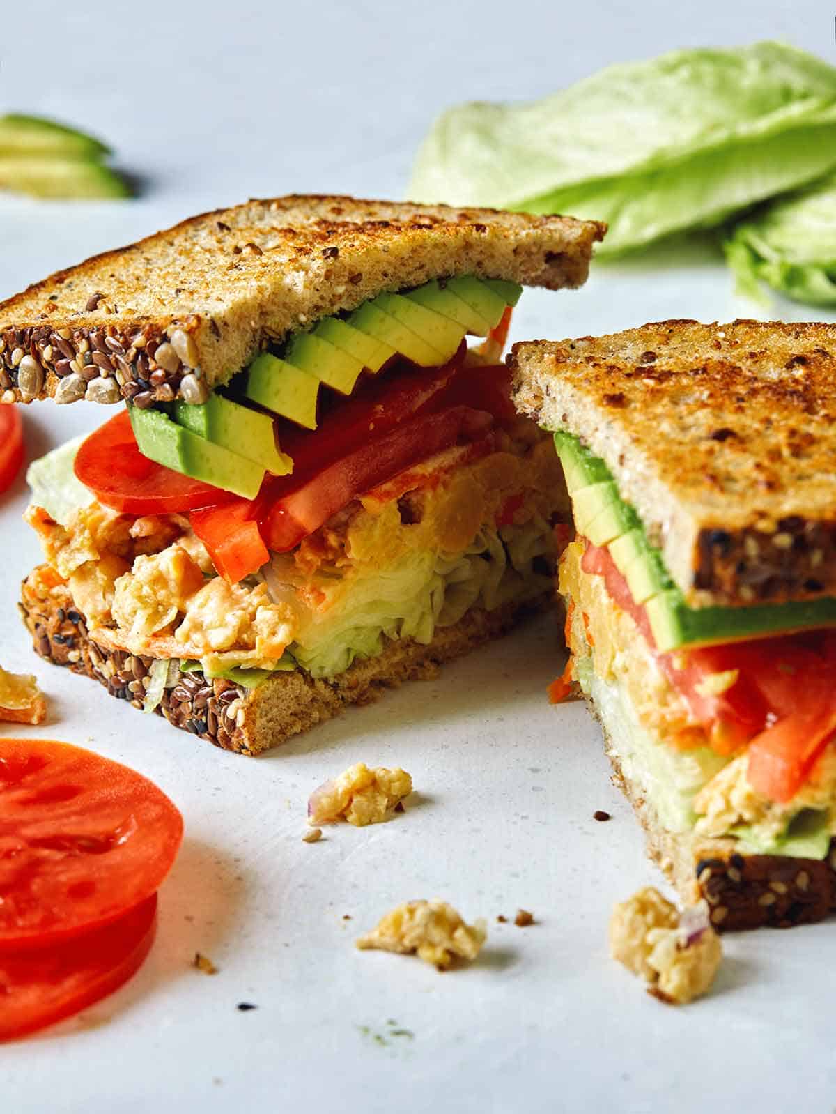 Chickpea salad sandwich cut in half. 