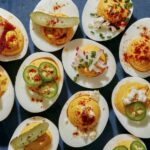 Deviled eggs on a platter.