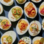 Deviled eggs on a platter.