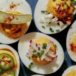 Close up on a platter of deviled eggs.