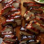 Char Siu recipe sliced on a cutting board.