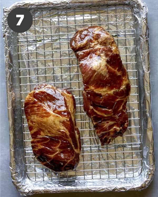 Char siu pork on a baking sheet. 