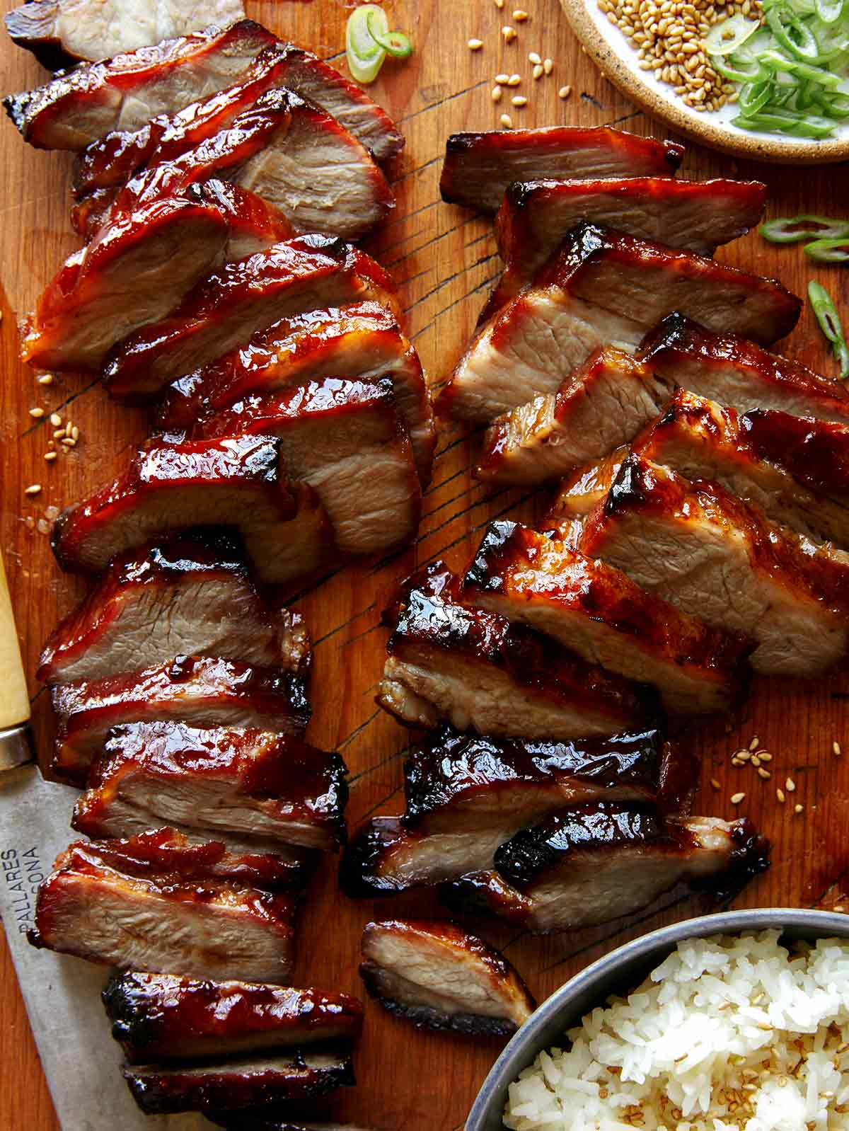 Char siu pork on a cutting board. 