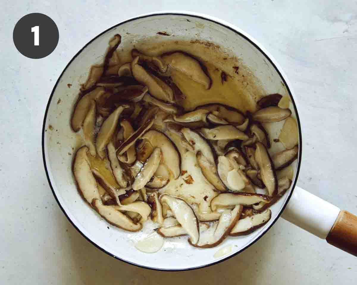 Mushroom gravy being made in a pot.