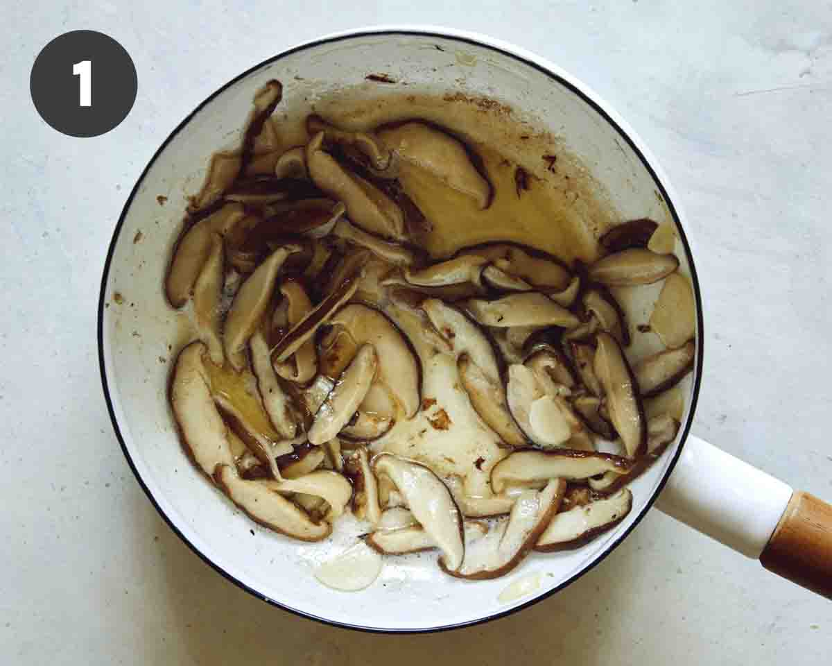 Mushroom gravy being made in a pot. 