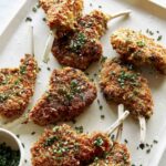 Panko crusted lamb chop recipe on a plate.