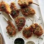 A platter of panko crusted lamb chops.