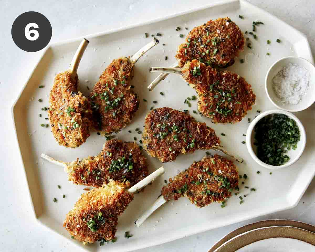 Panko lamb chops sprinkled with chives on top.