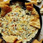 Spinach and artichoke dip in a skillet.