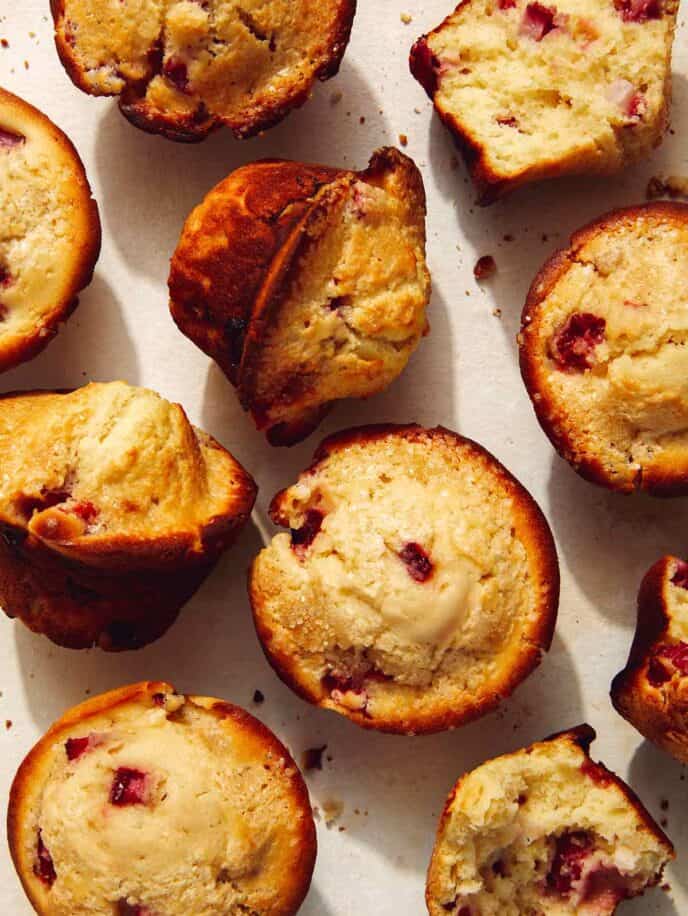 Close up on a batch of strawberry muffins.