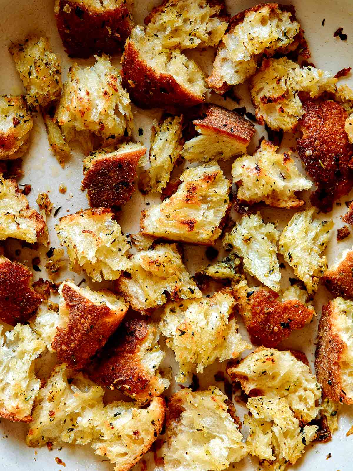 Homemade crouton recipe with torn bread.