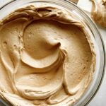 Peanut butter frosting in a bowl.