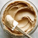 Peanut butter frosting in a bowl.