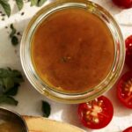 Red wine vinaigrette recipe in a jar.