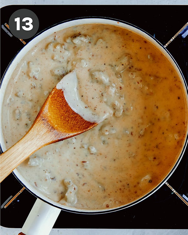 Gravy simmering in a pot. 