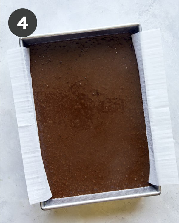 Batter poured into a prepared pan to make a cake.