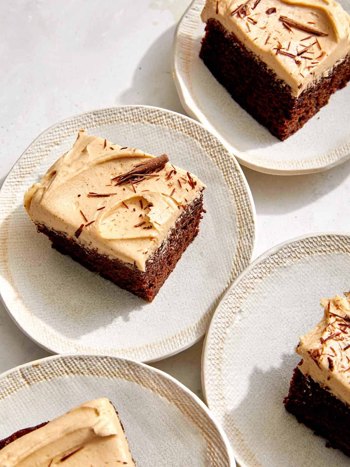 Slices of chocolate sheet cake with peanut butter frosting. 