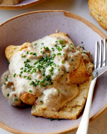 Biscuits and gravy recipe in a bowl.