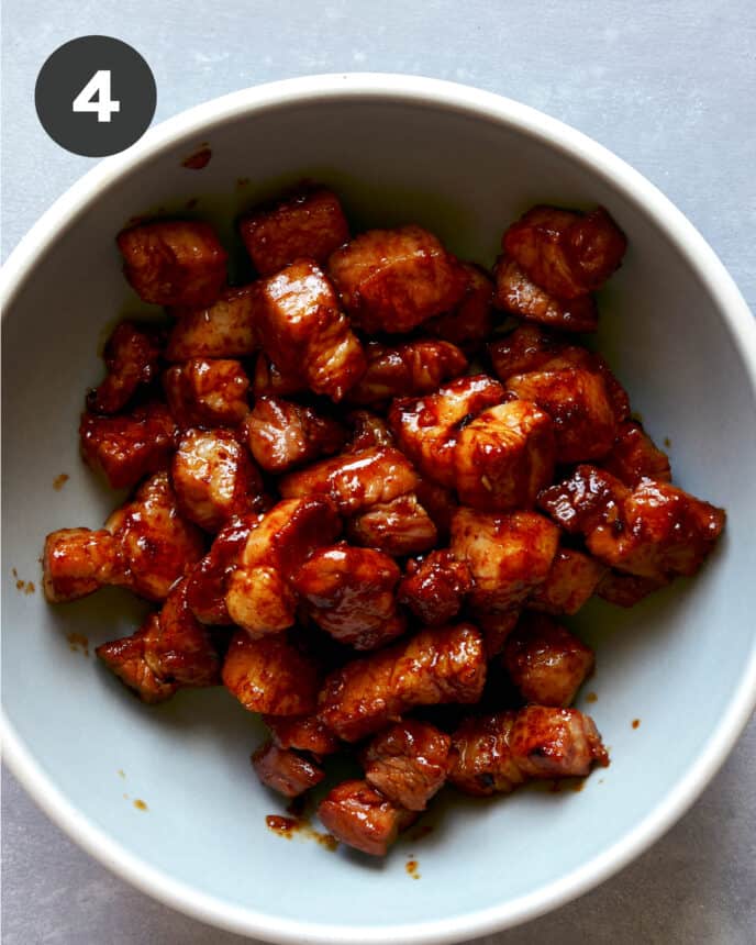 Pork belly cooked in a bowl.