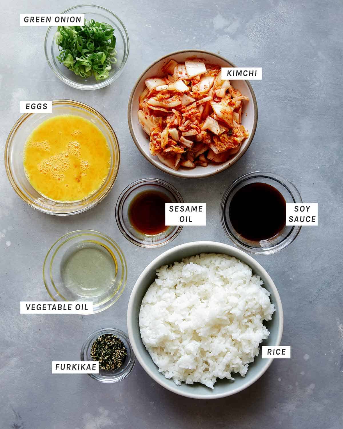 Kimchi fried rice ingredients on a counter. 