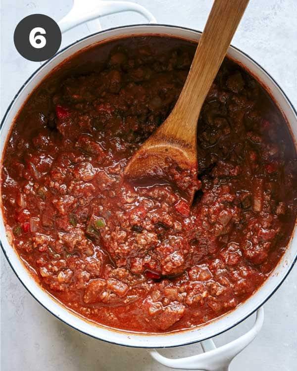 Kitchen sink chili being simmered in a pot. 