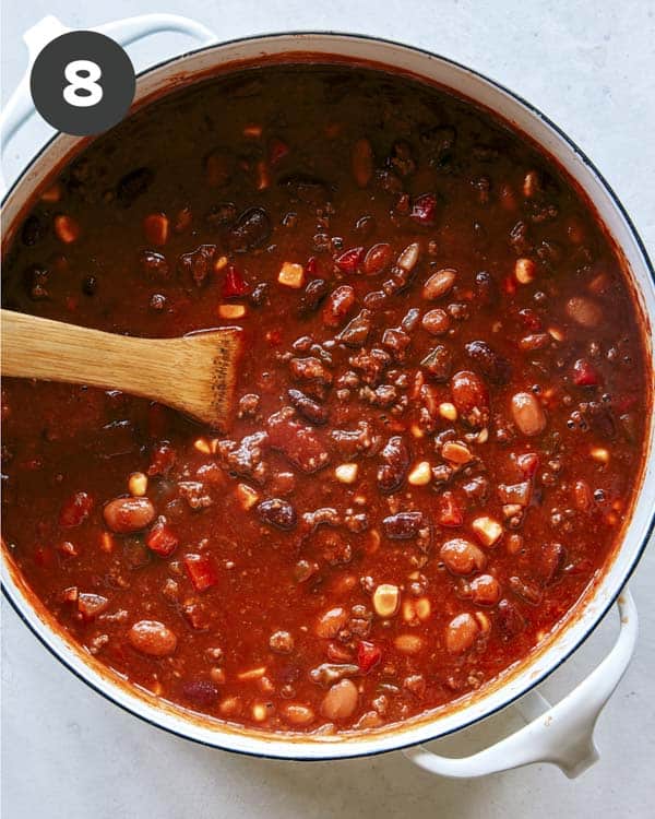 Kitchen sink chili cooking in a pot. 