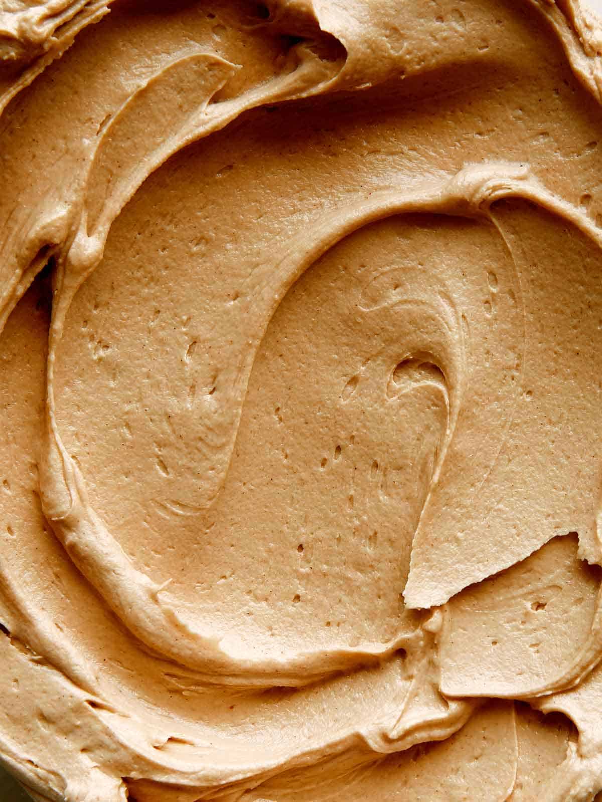 Close up on some peanut butter frosting. 