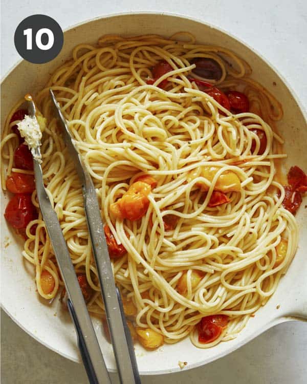 Roasted cherry tomato pasta in a skillet. 